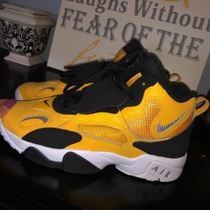 Black and yellow Nike’s. Youth size 6.5